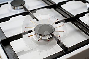 Closeup image ofa gas stove, problem