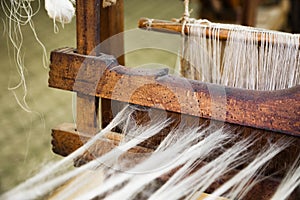 Closeup image of an old weaving Loom