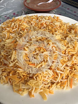 Closeup image of a plate of rice served in a Yemeni restaurant