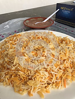 Closeup image of a plate of rice served in a Yemeni restaurant