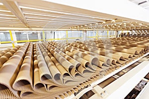 Closeup image of pleat cardboard row at factory background photo