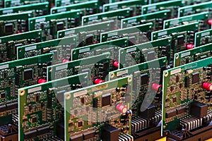 Closeup Image of Produced Automotive Printed Circuit Boards with Soldered Surface Mounted Components