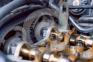 Closeup image, timing belt damaged on car. Vehicle engine and parts - automotive components photo