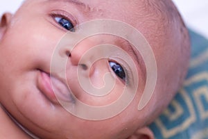 Closeup of Indian Baby in thoughts