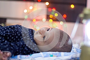 Closeup of Indian Baby with colorful bokeh
