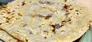 Closeup of Indian Traditional Cuisine Chapati The Phooli  Air filled Roti, Fulka, Indian Bread