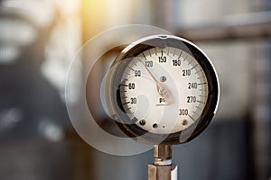 Closeup of industrial manometer measuring gas pressure on the plant