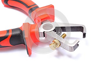 Closeup of insulation stripper on white background