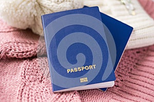 Closeup international passports on pink background. Free visa concept, travel, migration, politics, brexit