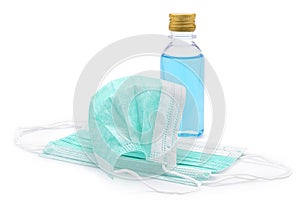 Closeup of isolated of heap green Surgical mask or face mask and 70% ethyl alcohol to prevent virus and bacteria. Corona virus and