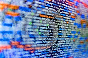 Closeup of Java Script and HTML code. Developer working on source codes on computer at office. Web abstract programming and
