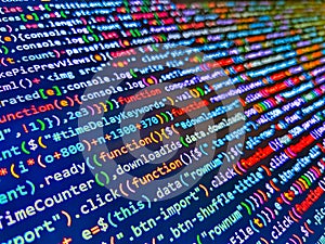 Closeup of Java Script and HTML code. M. Abstract source code background. HTML5 in editor for website deve. Information technology photo