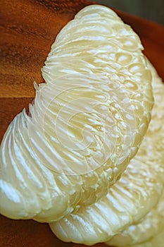 Closeup of Juice Vesicle of Peeled Pomelo Fruit Segment