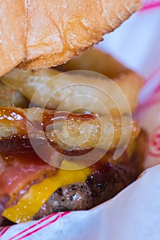 Closeup of juicy burger and fixings