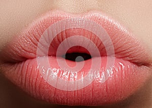 Closeup kiss natural lip makeup. Beautiful plump full lips on female face. Clean skin, fresh make-up. Spa tender lips