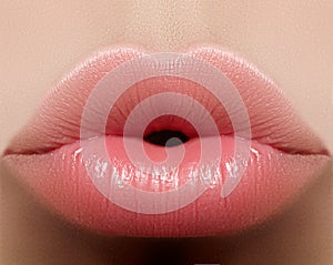 Closeup kiss natural lip makeup. Beautiful plump full lips on female face. Clean skin, fresh make-up. Spa tender lips photo