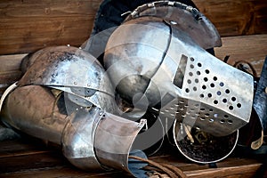 Closeup of a knight`s armor, helmet, glove and part of the trunk