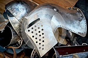 Closeup of a knight`s armor, helmet, glove and part of the trunk