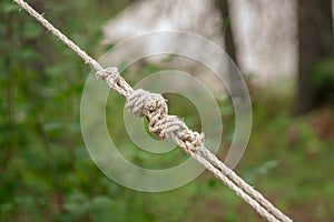 Closeup of knot tie back on tent