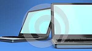 Closeup Of Laptops On Blue Background
