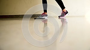 Closeup leg of fitness woman in sportswear dance abs at fitness gym.