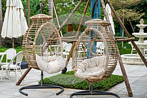 Closeup of leisure rattan hanging chair outdoors