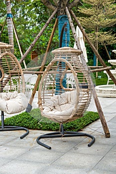 Closeup of leisure rattan hanging chair outdoors