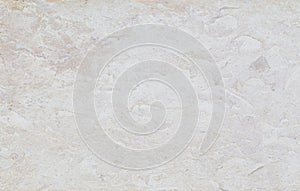 Closeup of a light stone slab background
