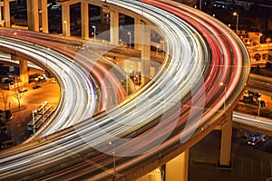 Closeup of the light trails on overpass