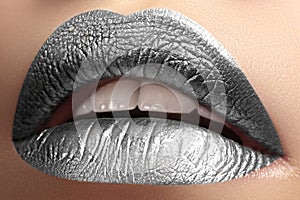 Closeup Lips with frost silver color Makeup. Fashion Celebrate Make-up for New Year. Shiny Christmas Glitter Lip style