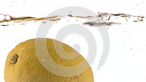 Closeup liquid with lemons. Abstract water background