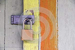 Closeup of lock on colorful old door