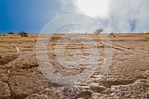 Closeup low angle view of the Western Wall in the old city of Jerusalem Israel