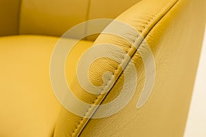 Closeup of luxury leather furniture detail - single-needle seam