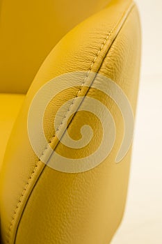 Closeup of luxury leather furniture detail - single-needle seam photo