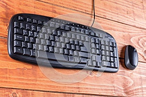 Closeup macro black pc keyboard with black wireless mouse