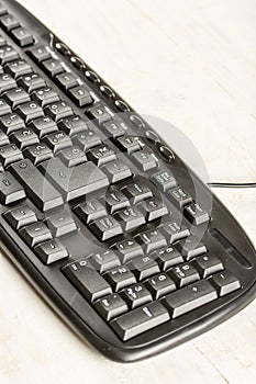 Closeup macro black pc keyboard with black wireless mouse