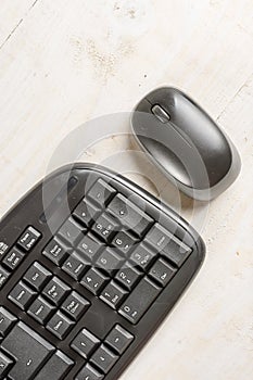 Closeup macro black pc keyboard with black wireless mouse