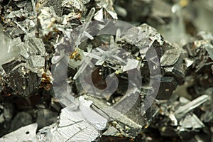 Closeup macro image of black lead zinc ore with irregular chaotic texture