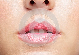 Closeup macro portrait of female part of face. Human woman lips with day beauty makeup