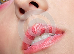 Closeup macro portrait of female part of face. Human woman lips with day beauty makeup