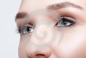 Closeup macro shot of blue human woman eye