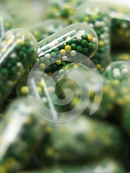 closeup macro shot of edible capsules with pills