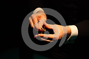 Closeup magician holding ring