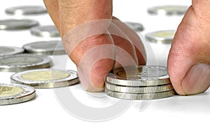 Closeup male hand put coin stack to money,Saving money concept of business concept