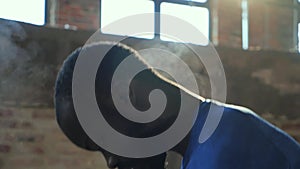 Closeup of male hands applying powder chalk magnesium at gym