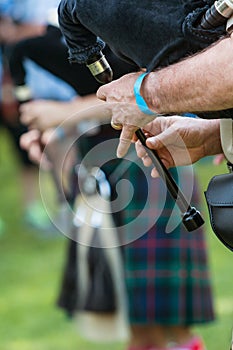 Closeup Male Hands Playing Bagpipes At North Georgia Event