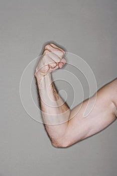 Closeup Of Man Flexing Biceps