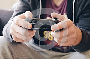 closeup of a man playing computer game