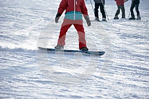 Closeup of man snowboarding
